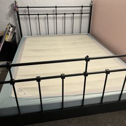 Queen size metal bed frame with Ikea foundation