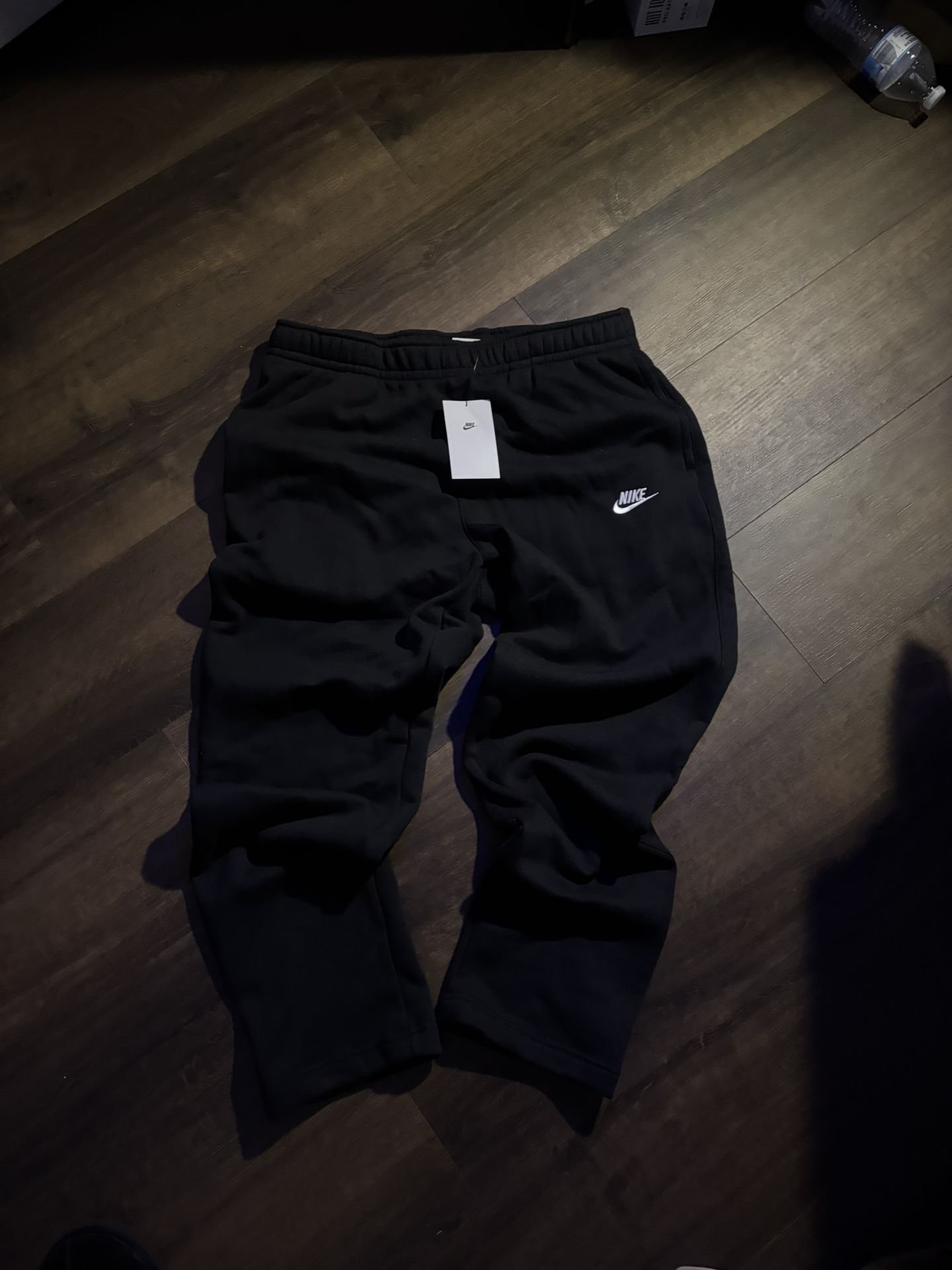 black uncuffed nike sweatpants