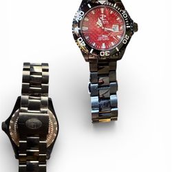Invicta Pro Diver models, likely a variation of the model 9312 with a red dial.