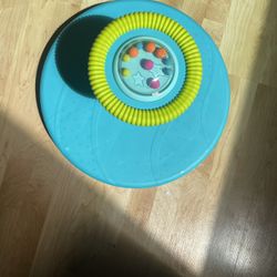 B. toys Twirly Time Spinning Activity Toy
