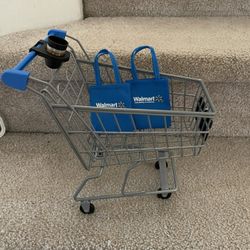Like New adorable small shopping cart with bags and cup and cup holder.   Smoke free home 
