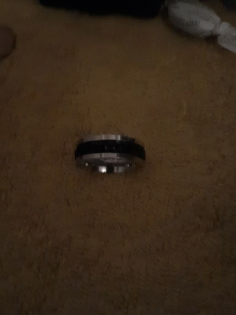 Silver Ring With Black In The Middle And Good Condition Okay