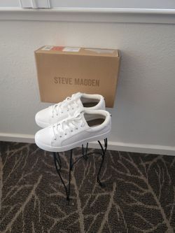Steve Matteen white sneakers