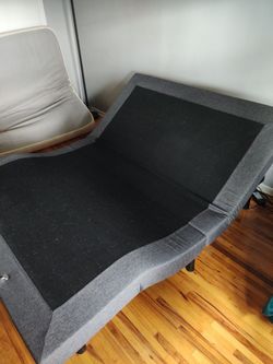 Adjustable queen sized bed frame