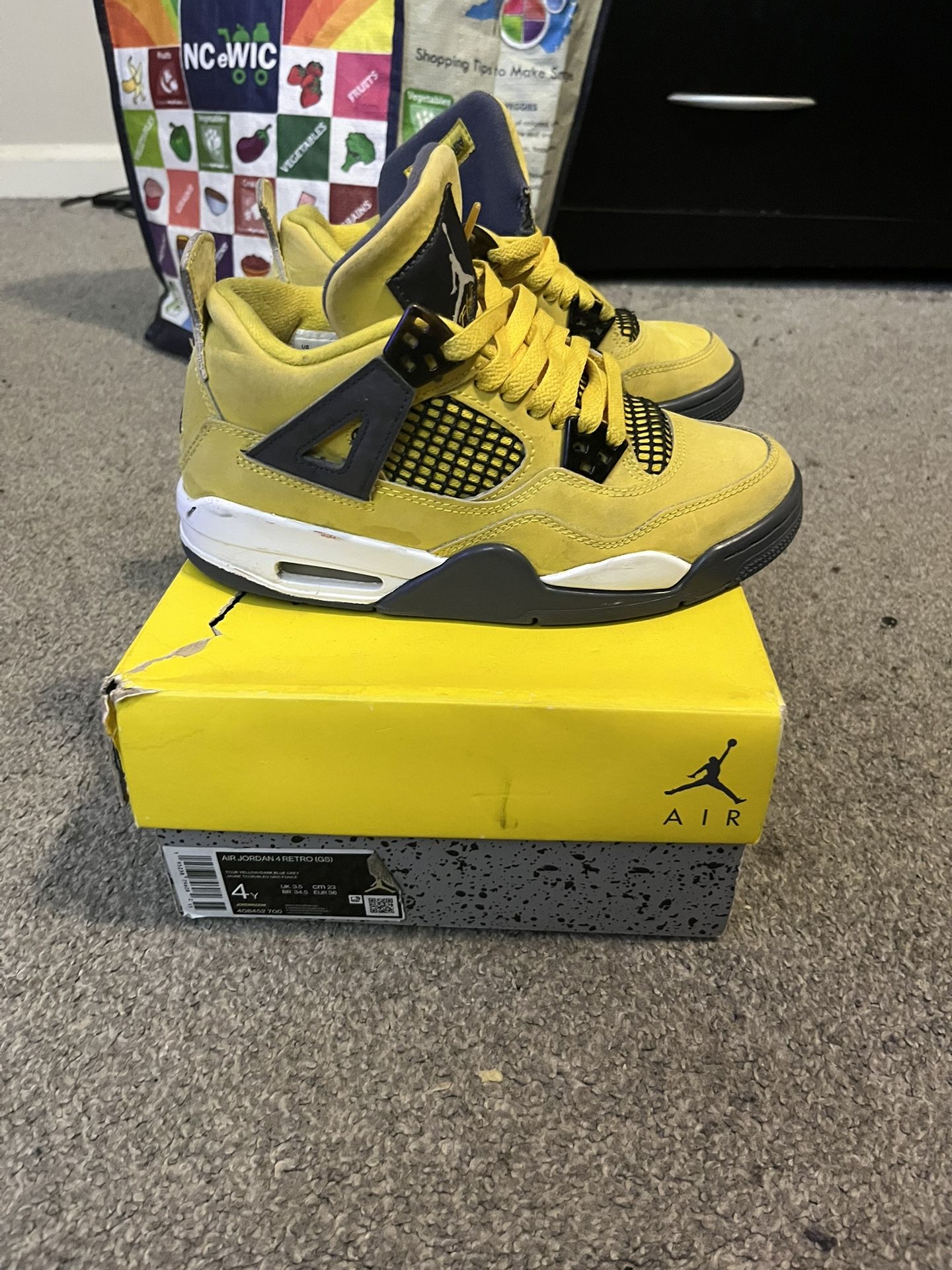 Size 4 Boys Jordan 4 Retro Lightning 2021