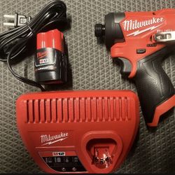 New Milwaukee Fuel M12 Impact Driver 2AH Battery and Charger