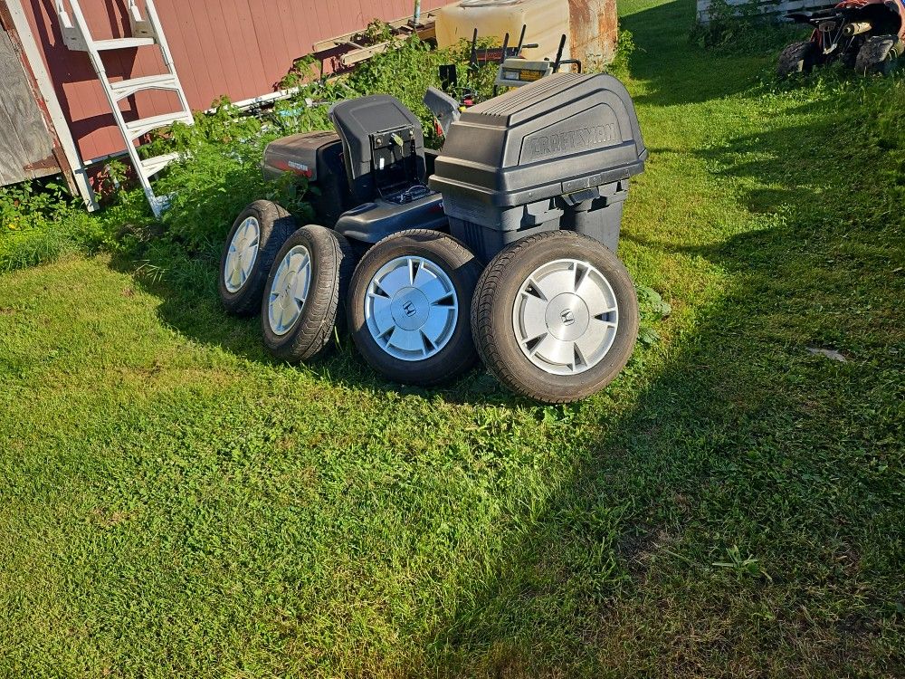 Set a 415 inch Honda tires. And rims
