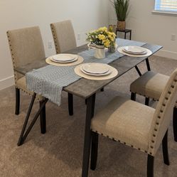 TABLE ONLY. Chairs & decor not included.