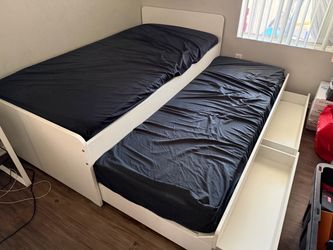 Twin size bed frame + Twin size pull out + storage *No Mattress*