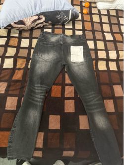 Used purple jeans