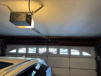 Garage Door Opener Broken Spring Off Track Replace Adjustment And Parts