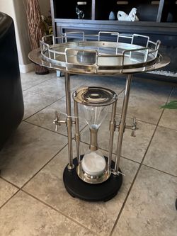 Hour glass table