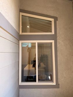 White Vinyl Sliding Window