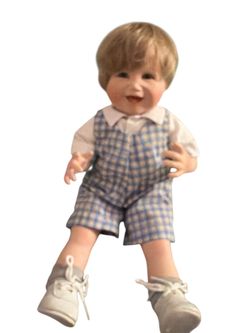 porcelain doll, possibly "Matthew" from the Picture Perfect Babies collection by Yolanda Bello for the Ashton-Drake Galleries.  The doll features blon