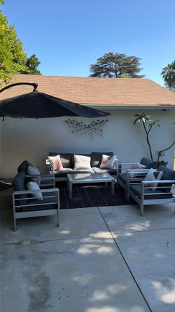 Christopher Knight outdoor set with cantilever umbrella.