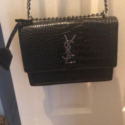 YSL Embossed Leather https://offerup.com/redirect/?o=QmFnLk5ldw==