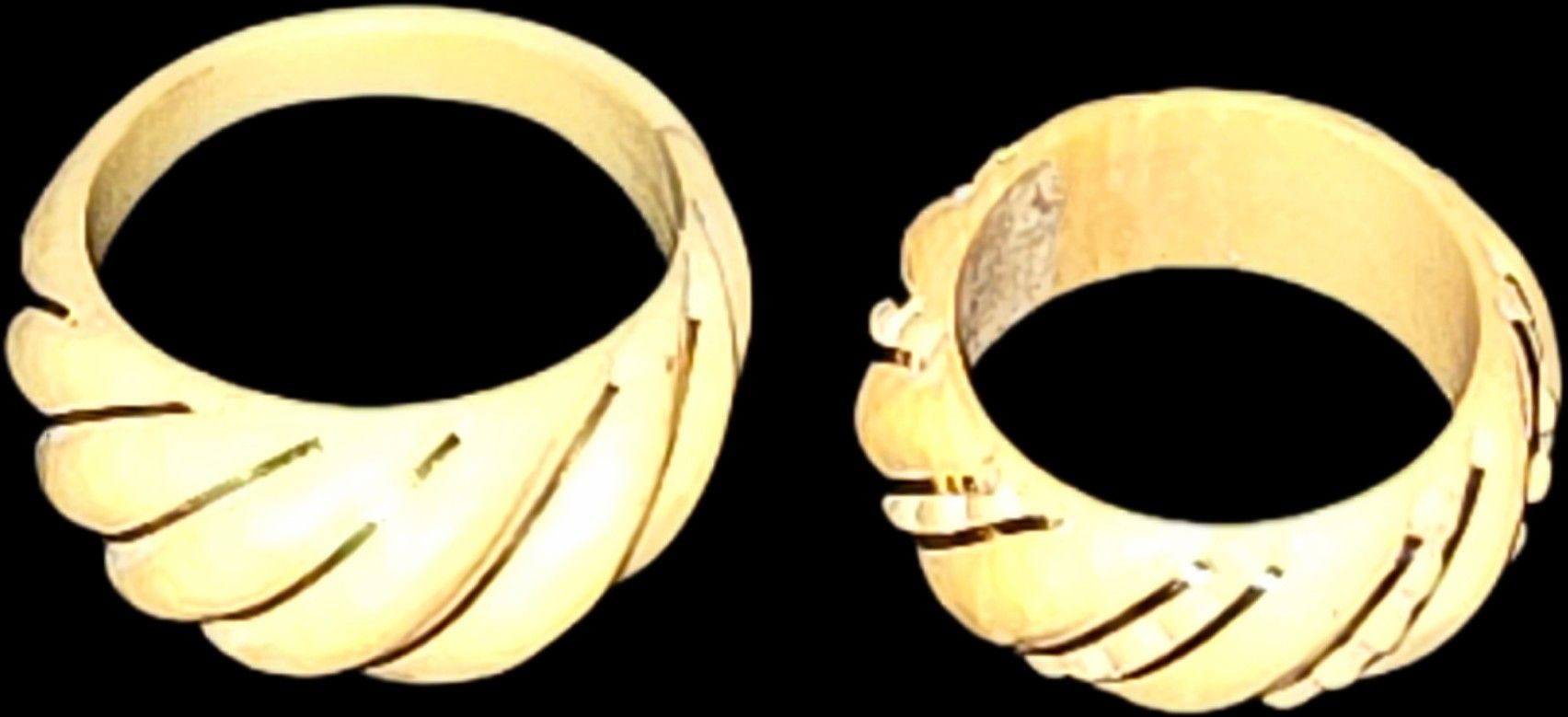pair of His And Hers carved ivory bone + 14k Gold Acc. rings with a spiral design.