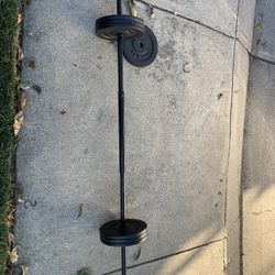 70 lbs of Weights On A Straight Bar