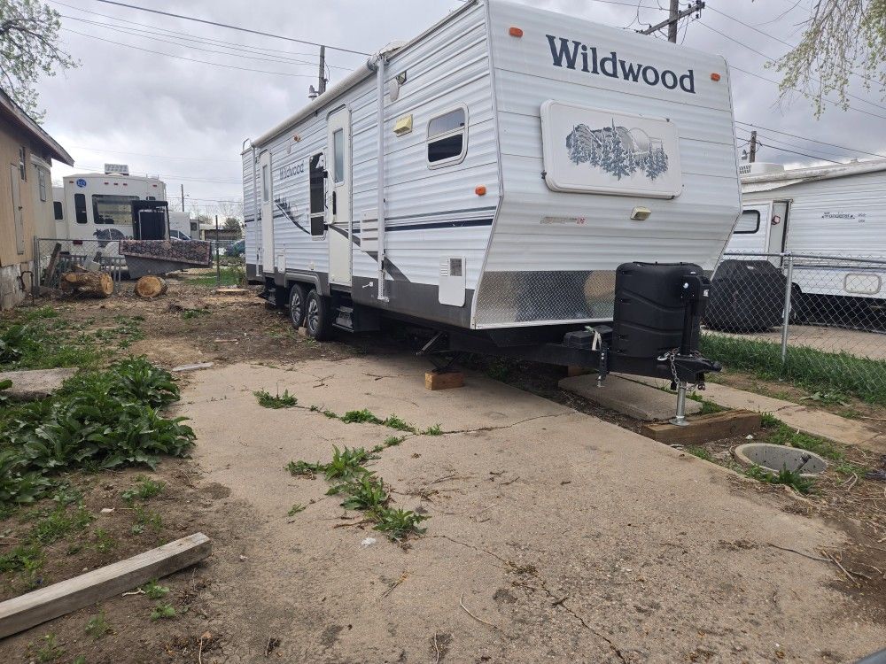 Travel Trailer Inside Lot To Live In