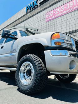 New raceline 17x9 6x139.7 Machine wheels & 357017 35” A/T Tires ( We Finance)