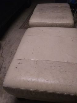 Two leather style ottoman