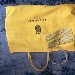 yellow Goyard purse