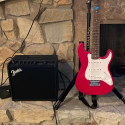 Mini Fender Guitar, Fender Amp, And Guitar Strap And Amp Cable Bundle 