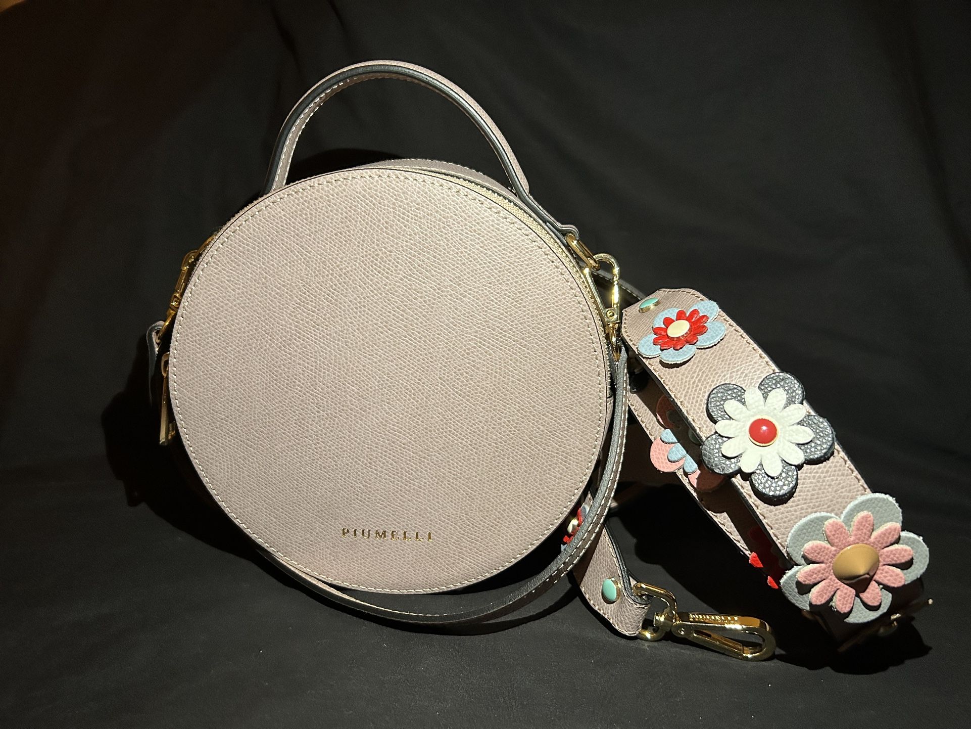 Piumelli round bag sale