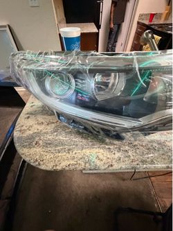 Kia optima right headlight