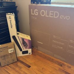 77 Inch Lg Smart Tv./Comes With Sound Bar And Woofer Also Wall Mount