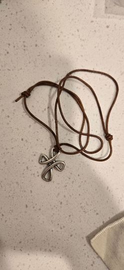 Retired JA ribbon cross ring