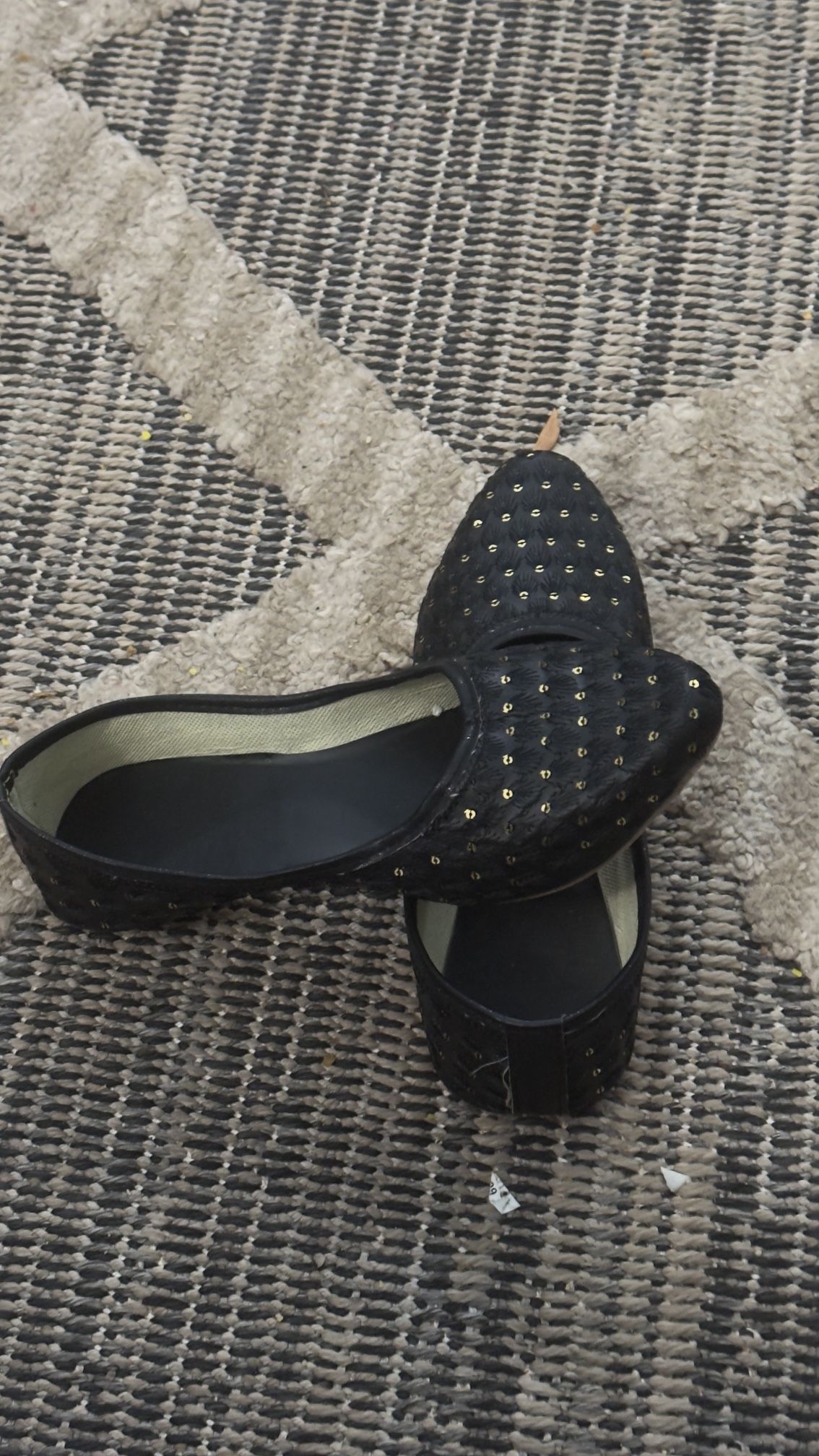 LADIES FLAT SLIP ON SHOES IN A BLACK AND GOLD COLOR IN A SIZE 7 WORN ONLY TWICE MINT CONDITION 