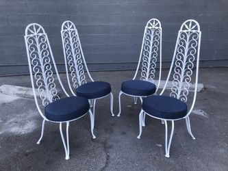 Mid Century Arthur Umanoff High Back Iron Chairs.
