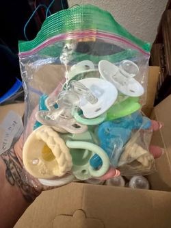 Bag of different pacifiers