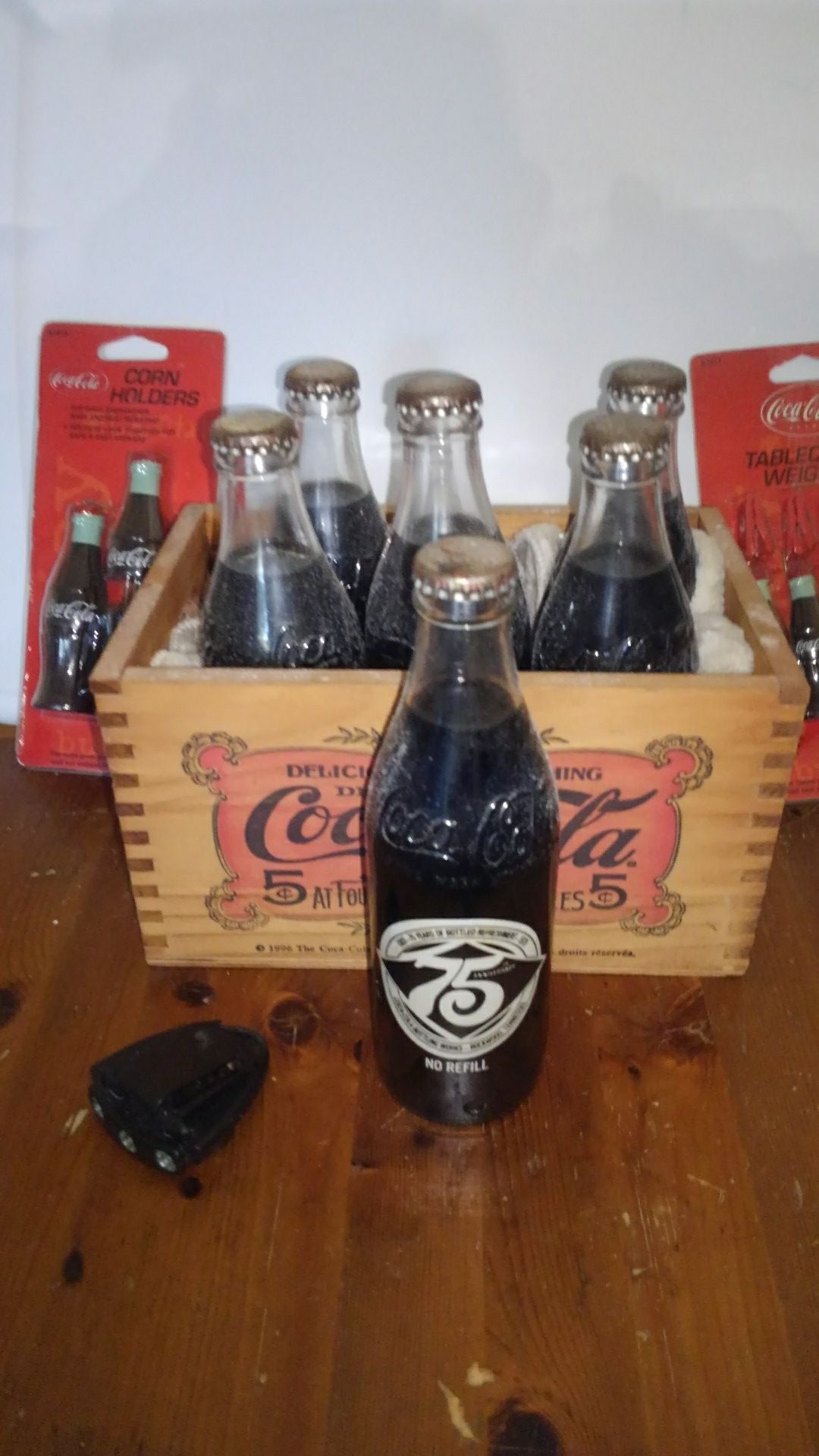 Antique coca cola anniversary bottles