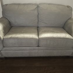 Gray loveseat