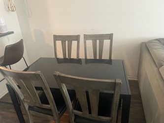 Dining table + 4 chairs. Great condition!