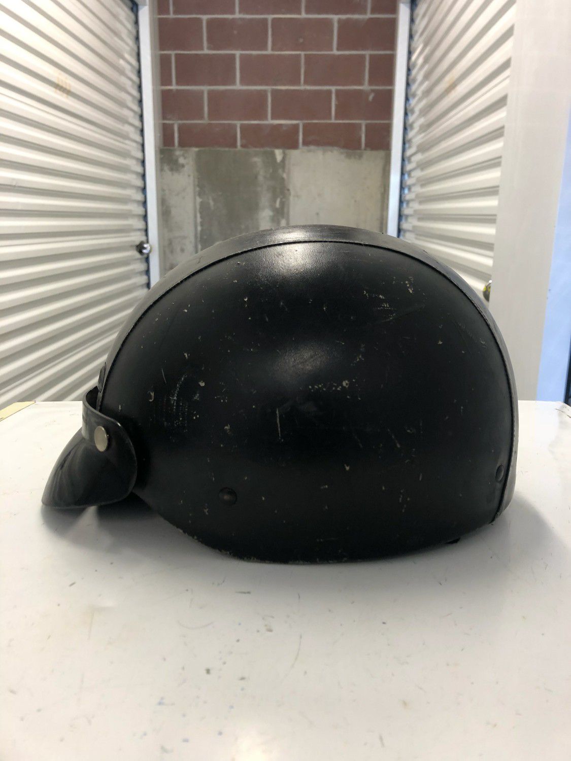 Small leather half shell motorcycle helmet
