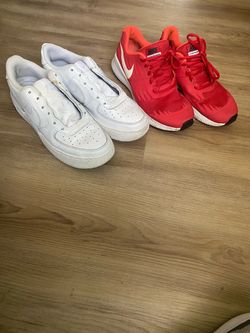 Two Pairs of Nike Sneakers Nike Air Force and Nike star runner