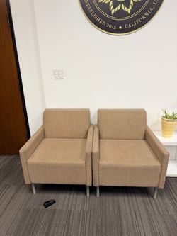 Brown arm chair pair