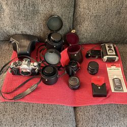 Canon AE-1 Program Camera With Leather Case, Cover and 4 Lenses