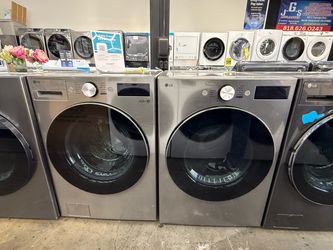 New open box LG Stainless Steel front load washer and gas dryer set