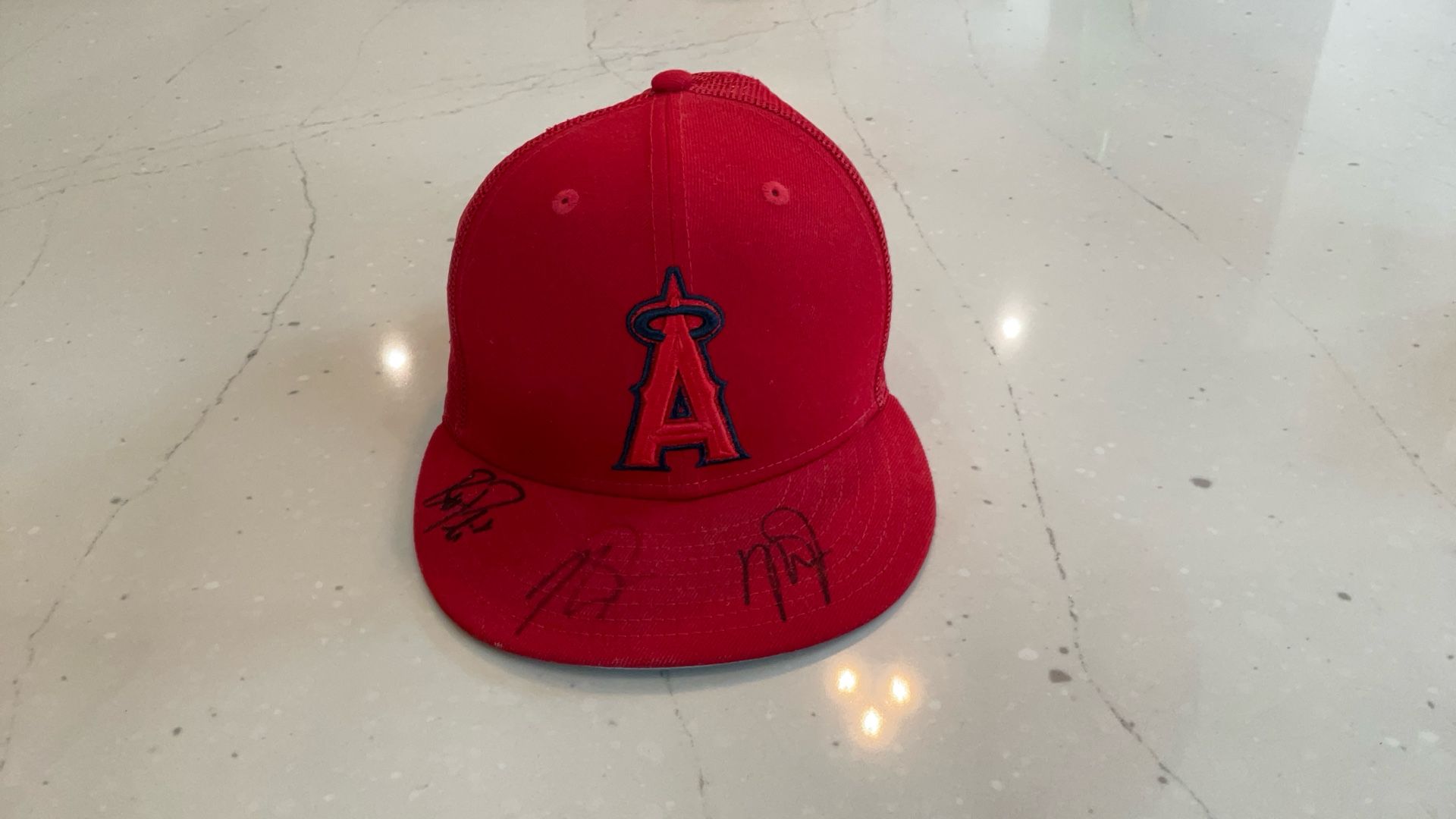 Angels Hat, hand signed by Mike Trout twice, and Brett Phillips