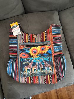 Brand new Rising hand bag