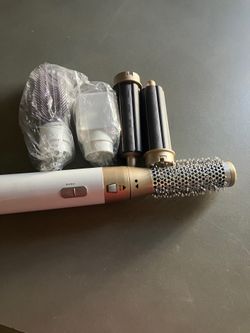 Round hair curler with multiple pieces