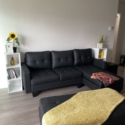 black couch + ottoman