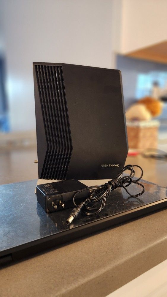 NETGEAR Nighthawk Cable Modem with Built-in WiFi 6 Router (CAX80)