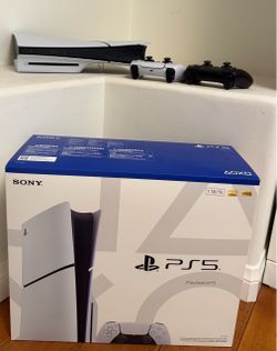 Sony PS5 Slim-Disc Edition (1TB) with 2 controllers (white and black) and original box with wires.