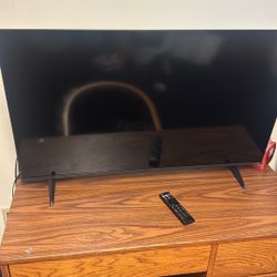 42 Inch Vizio, Kenmore Microwave, And Whirlpool Mini Fridge 