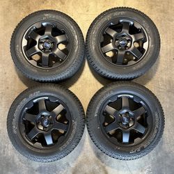 OEM Subaru Outback Wilderness Matte Black Wheels And Yokohama Geolander A/T Tires